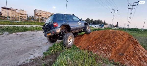 קיה ספורטז' 4X4 DLX ידני גג ברזנט 2.0 (128 כ''ס) בנזין 2002 למכירה בנשר