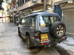 מיצובישי פג'רו ארוך 4X4 GLX אוט' דיזל 7 מק' 2.8 (125 כ''ס) דיזל 1999 