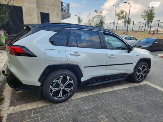 טויוטה RAV4 הייבריד 4X4 E-Motion פלאג-אין אוט' 2.5 (185 כ''ס) היברידי חשמל / בנזין 2023 למכירה בירושלים