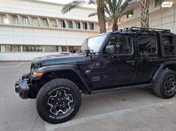 ג'יפ / Jeep רנגלר ארוך Unlim Rubicon 4XE אוט' הייב' 2.0 (270 כ''ס) ק' 7 היברידי חשמל / בנזין 2021 למכירה בחדרה