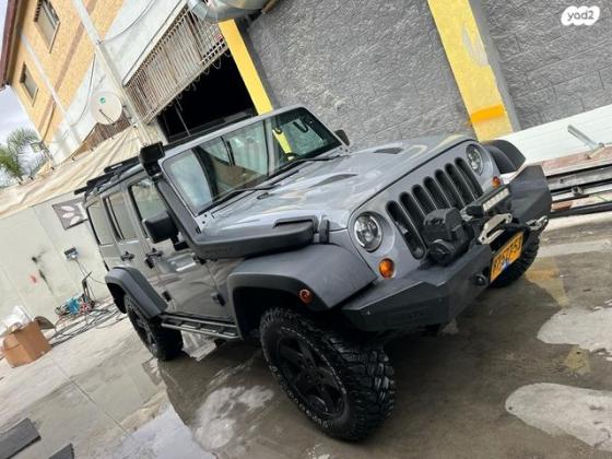 ג'יפ / Jeep רנגלר ארוך 4X4 Unlimited Sport אוט' 3.6 (280 כ''ס) ק'-2 בנזין 2013 למכירה בבית שמש