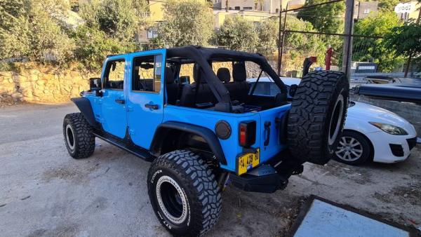 ג'יפ / Jeep רנגלר ארוך 4X4 Unlimited Sport אוט' 3.6 (280 כ''ס) ק'-2 בנזין 2017 למכירה בהושעיה