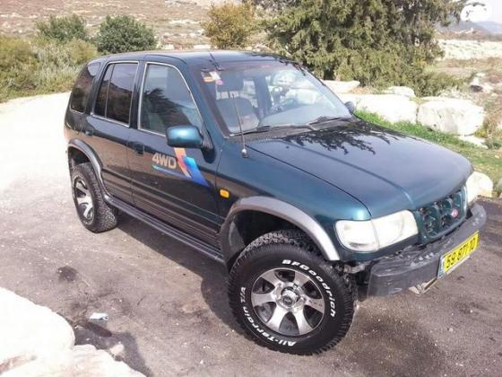 קיה ספורטז' 4X4 DLX אוט' 2.0 (128 כ''ס) בנזין 2001 למכירה ברמת דוד