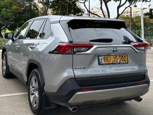 טויוטה RAV4 הייבריד E-xperience הייבריד 5 דל' אוט' 2.5 (178 כ''ס) בנזין 2022 למכירה בנתניה